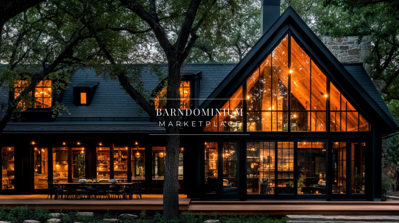 A stunning modern black barndominium with floor-to-ceiling windows, glowing warmly in the evening light, nestled under a large tree for a serene and cozy ambiance.