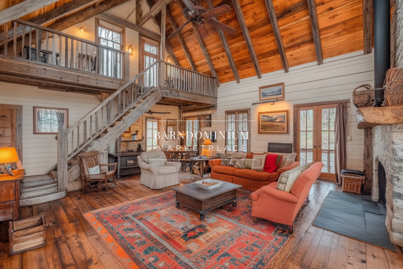 Rustic yet elegant barndominium interior featuring exposed wooden beams, a cozy loft, and an inviting open-concept living space with vintage charm.