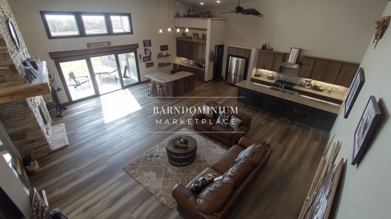 Spacious barndominium interior with an open floor plan, high ceilings, and a cozy rustic design.