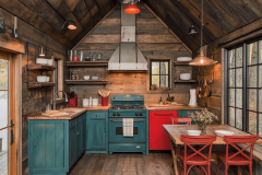 Charming rustic kitchen with bold pops of red and teal cabinets.