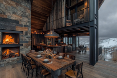 Stunning rustic-industrial barndominium with an open dining space, stone fireplace, and breathtaking mountain views.