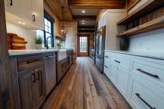 A stunning barndominium kitchen featuring a modern farmhouse design with rustic wood accents, white cabinetry, and open shelving for a perfect blend of style and function.