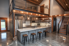 Sleek Industrial Barndominium Kitchen with Open Loft and Rustic Touches