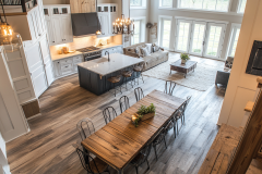 Bright and Elegant Barndominium Kitchen with Vaulted Ceilings and Open Dining