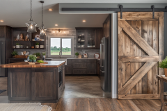 Cozy Rustic Barndominium Kitchen with Sliding Barn Door and Wood Accents